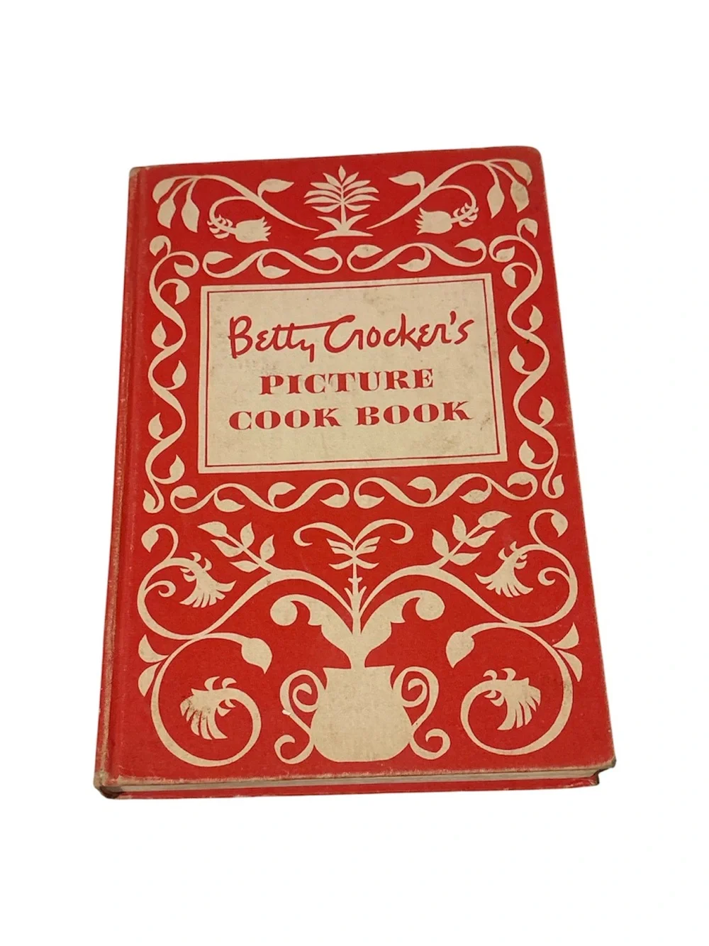 vintage 1950 edition of Betty Crocker's Picture Cook Book.